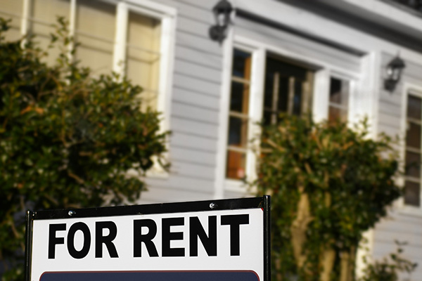 For rent sign in front of a house